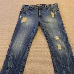 A Koo Brand distressed denim GUC 38